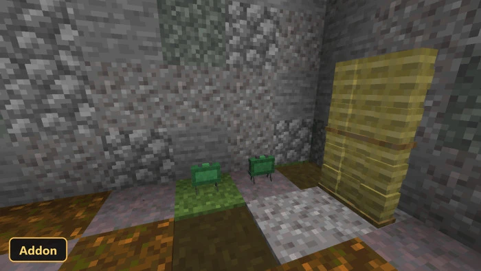 two green landmines on the ground in a stone room