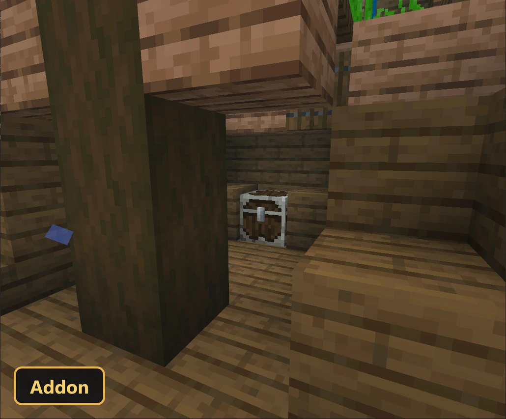 interior of a wooden structure with a chest and wooden planks
