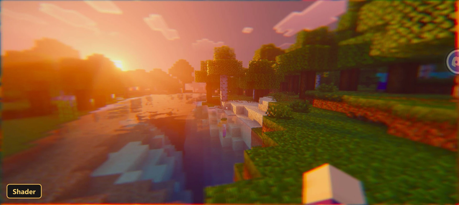 vibrant sunset over a river with lush green banks and trees