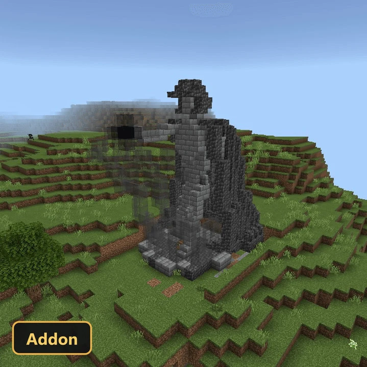 large stone and dark glass structure on a grassy hill