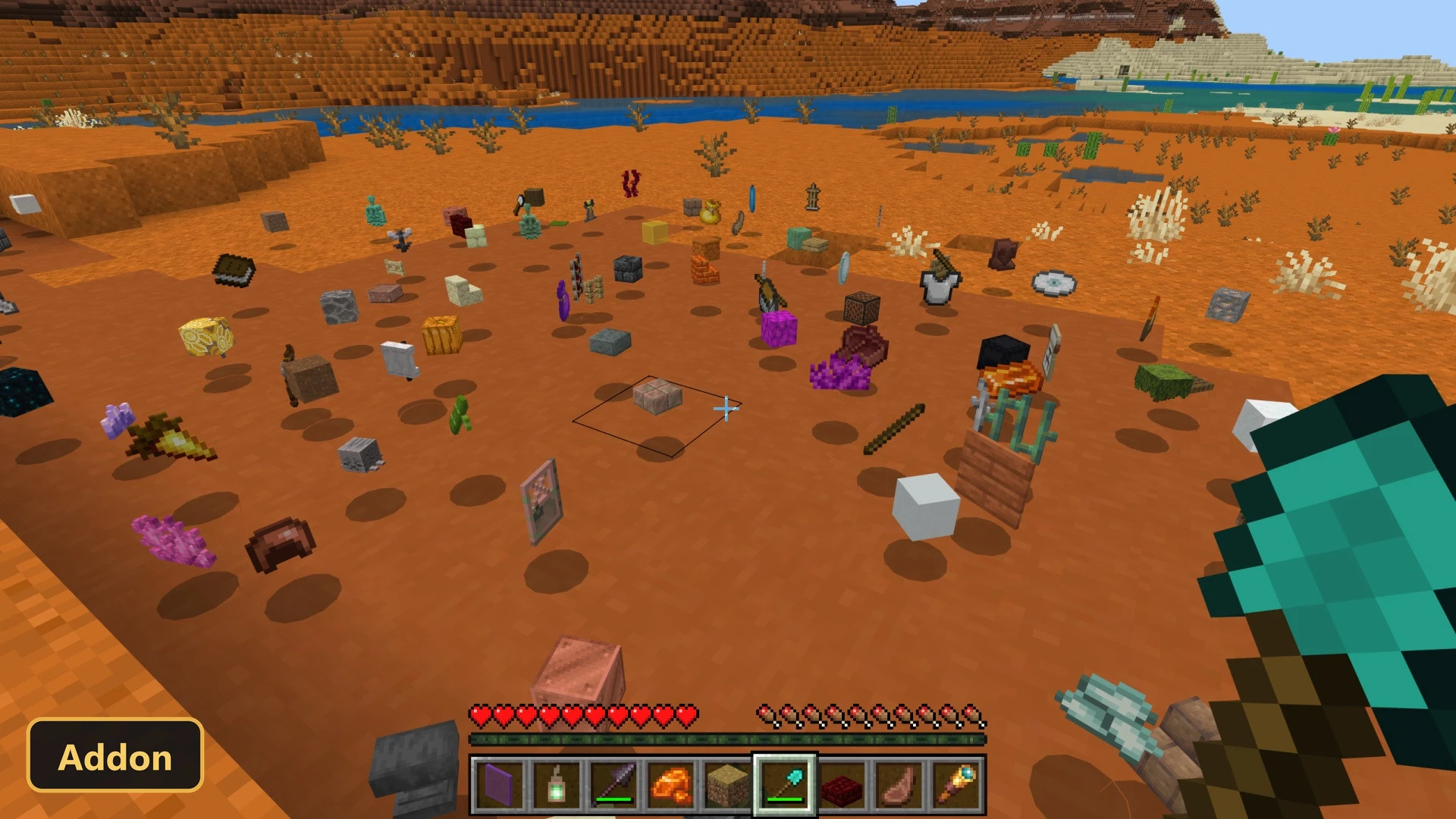desert biome with many items and blocks scattered on the ground