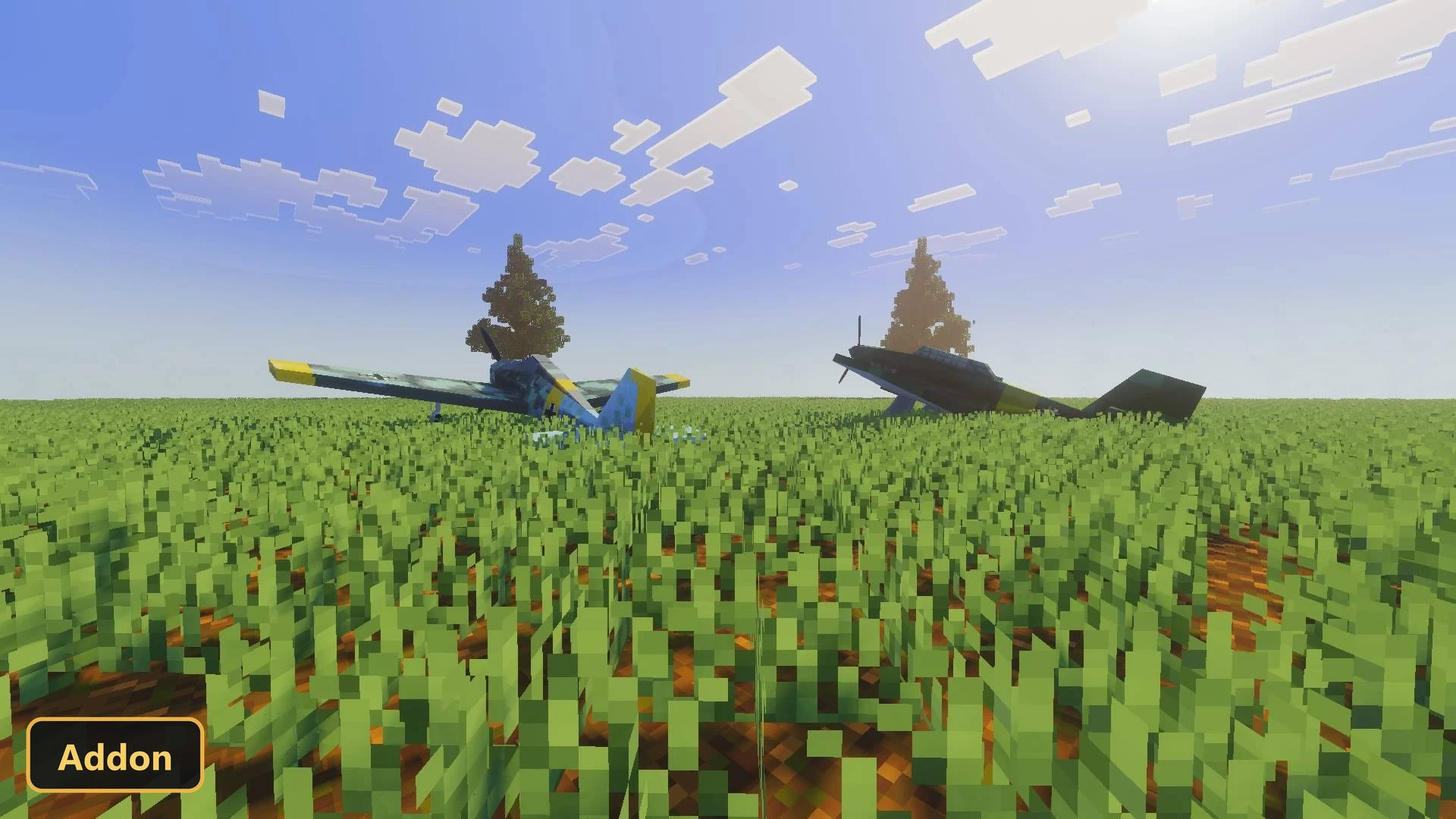 two crashed airplanes in a field of green grass