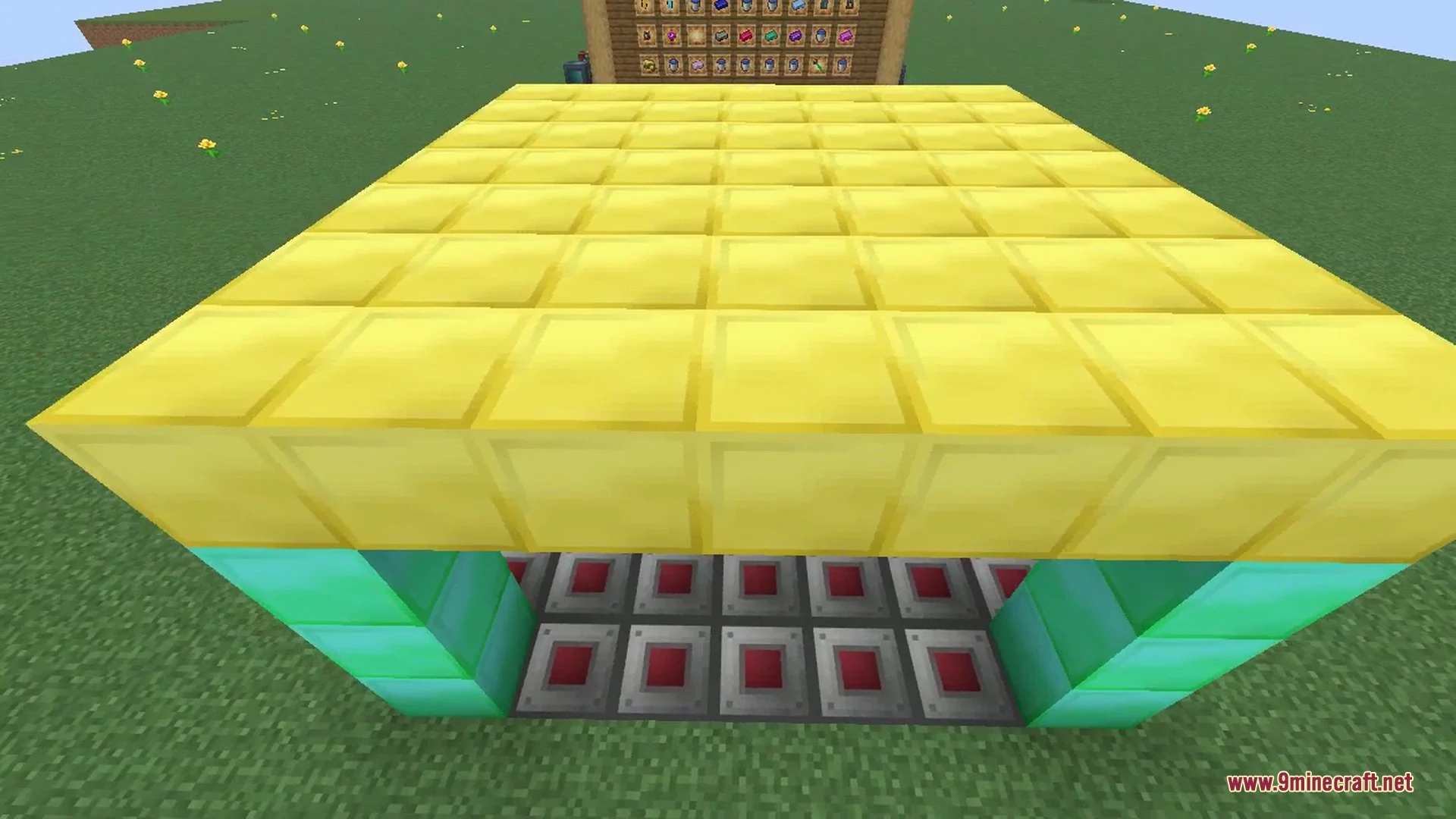 The Big Reactors creative tab, showing the mod's blocks and items: Yellorium ore and ingots, reactor casing and glass, fuel rods, ports, and coolant parts.